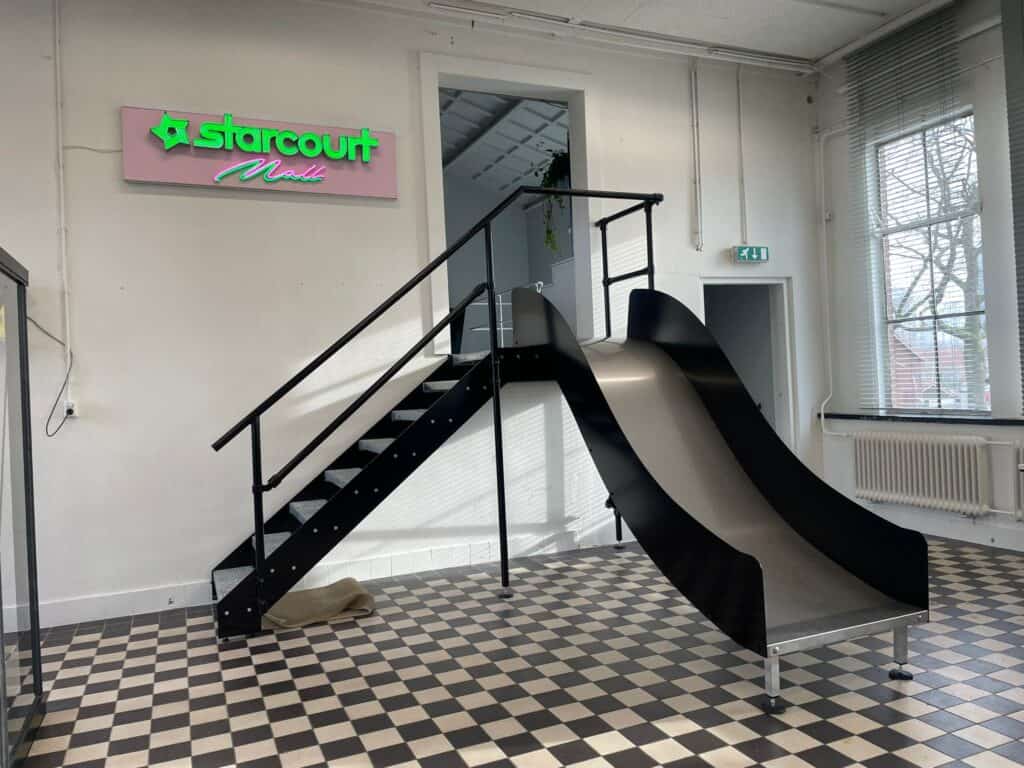 Firma Buitelaar - Kantoorglijbaan maatwerk glijbaan voor volwassenen