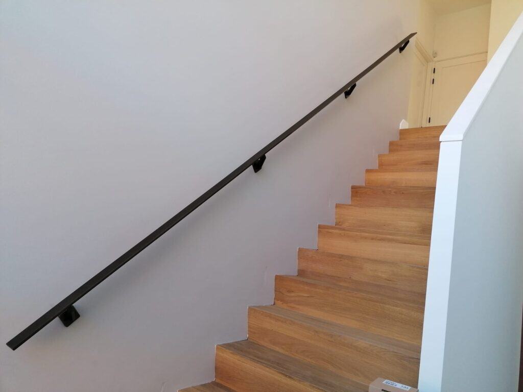 Firma Buitelaar - Trapleuning uit platstrip industrieel